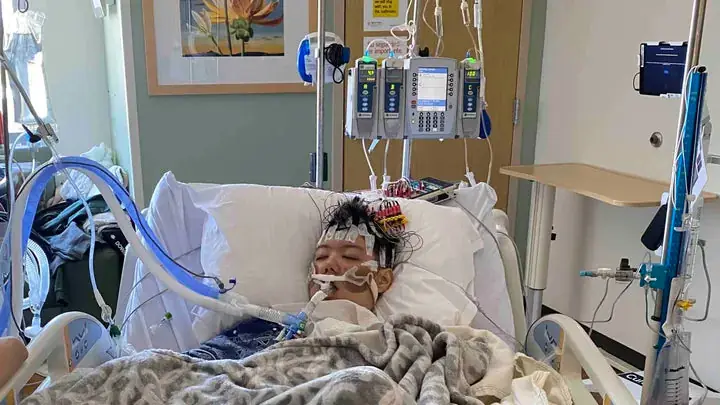 Jason in hospital after his brain tumor and stroke